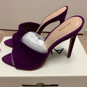 Brand new, suede purple mules by Aldo.